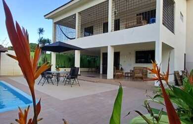 Imagem: A casa à venda possui 5 Dormitórios e 3 Vagas na garagem e