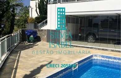 Imagem: A casa em condomínio possui 4 Dormitórios, 5 Banheiros, 5