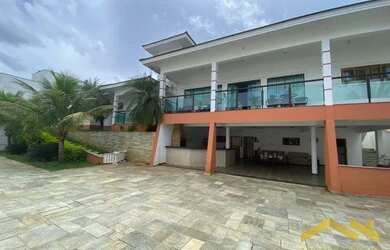 Imagem: A casa em condomínio possui 4 Dormitórios, 4 Banheiros, 5