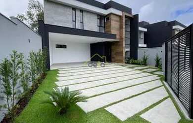 Imagem: A casa possui 3 Dormitórios, 3 Banheiros, 5 Vagas na garagem