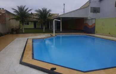 Imagem: A casa possui 2 Dormitórios e 2 Vagas na garagem e está localizado