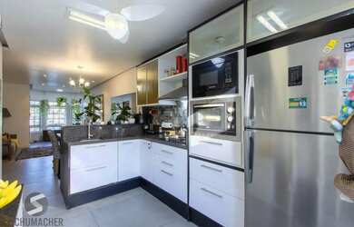 Imagem 10: Sobrado com 2 dormitórios, sendo 1 ampla suíte com banheira de hidromassagem, 2 vagas