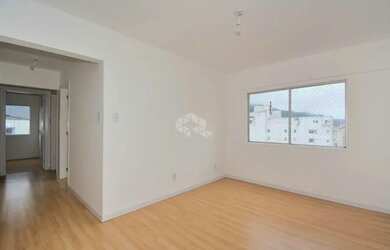 Imagem: O apartamento possui 3 Dormitórios, 1 Banheiro, 1 Vaga na garagem