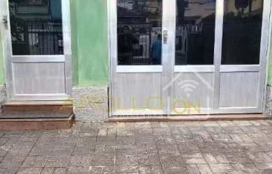 Imagem: A casa possui 3 Dormitórios, 2 Banheiros, 3 Vagas na garagem