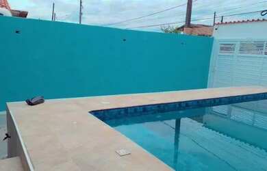 Imagem: A casa possui 4 Dormitórios, 3 Banheiros e Imóvel novo e está