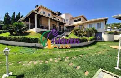 Imagem: A casa em condomínio possui 4 Dormitórios, 5 Banheiros, 5