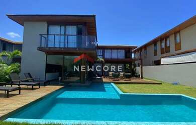 Imagem: A casa possui 5 Dormitórios, 5 Banheiros, 4 Vagas na garagem