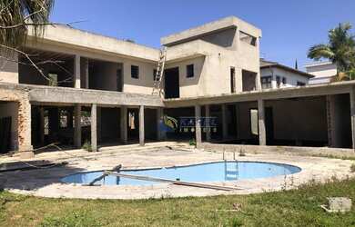 Imagem: A casa em condomínio possui 5 Dormitórios, 5 Banheiros, 5