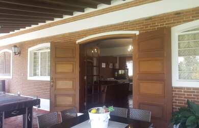 Imagem 16: Casa de condomínio. Piscina, Churrasqueira, VarandaeLareira