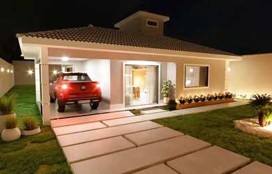 Imagem: A casa possui 3 Dormitórios, 2 Banheiros, 1 Vaga na garagem