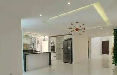 Imagem: A casa possui 4 Dormitórios, 5 Banheiros, 3 Vagas na garagem