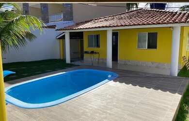 Imagem: A casa possui 4 Dormitórios, Acomodam 10 pessoas, 3 Vagas na