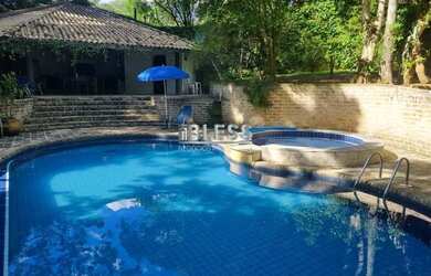 Imagem: A casa em condomínio possui 3 Dormitórios, 5 Banheiros, 4