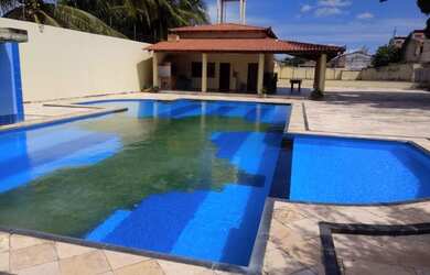 Imagem: A casa possui 5 Dormitórios, 5 Banheiros, 4 Vagas na garagem