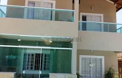 Imagem: A casa possui 5 Dormitórios, 5 Banheiros, 4 Vagas na garagem