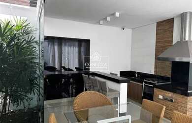 Imagem: A casa possui 2 Dormitórios, 3 Banheiros, 2 Vagas na garagem