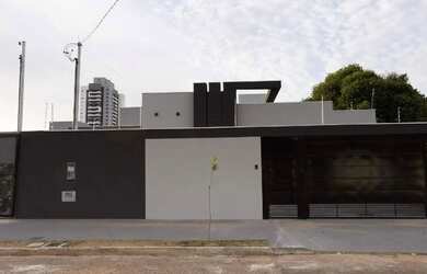 Imagem: A casa possui 3 Dormitórios, 5 Banheiros, 4 Vagas na garagem