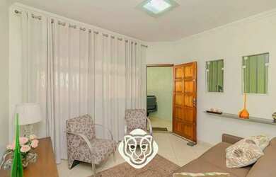 Imagem: A casae possui 3 Dormitórios, 3 Banheiros, 4 Vagas na garagem