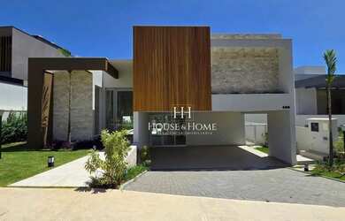 Imagem: A casa possui 4 Dormitórios, 5 Banheiros, 5 Vagas na garagem