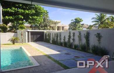 Imagem: A casa em condomínio possui 5 Dormitórios, 5 Banheiros, 4