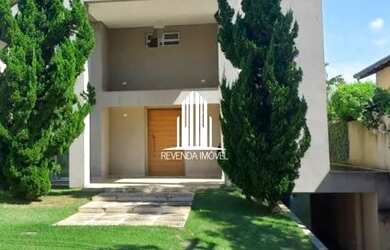 Imagem: A casa em condomínio possui 4 Dormitórios, 4 Banheiros, 488m²