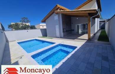 Imagem: A casa possui 3 Dormitórios, 2 Banheiros, 4 Vagas na garagem