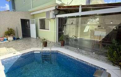 Imagem: A casa em condomínio possui 5 Dormitórios, 5 Banheiros, 4