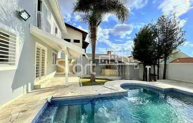 Imagem: A casa possui 2 Dormitórios, 4 Banheiros, 4 Vagas na garagem