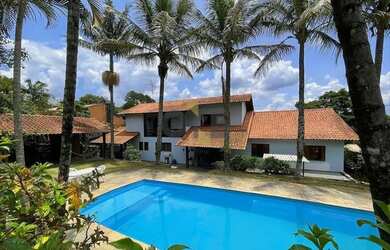 Imagem: A casa em condomínio possui 5 Dormitórios, 5 Banheiros, 5