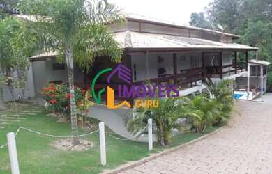 Imagem: A casa possui 3 Dormitórios, 5 Banheiros, 4 Vagas na garagem