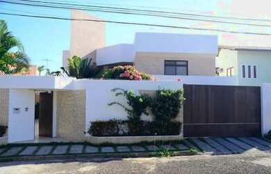 Imagem: A casa possui 5 Dormitórios, 5 Banheiros, 4 Vagas na garagem