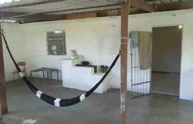 Imagem: A casa possui 2 Dormitórios, 1 Banheiro, 1 Vaga na garagem