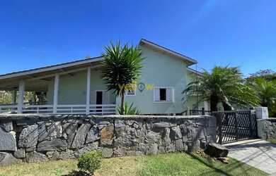 Imagem: A casa em condomínio possui 5 Dormitórios, 5 Banheiros, 5