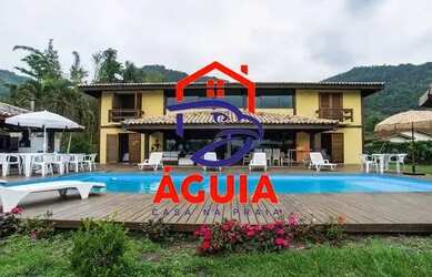 Imagem: A casa possui 5 Dormitórios, 5 Banheiros, 4 Vagas na garagem