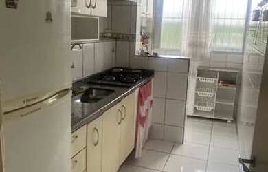 Imagem: O apartamento possui 2 Dormitórios, 1 Banheiro, 1 Vaga na garagem