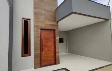 Imagem: A casa possui 3 Dormitórios, 2 Banheiros, 2 Vagas na garagem