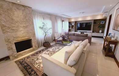 Imagem: A casa em condomínio possui 4 Dormitórios, 5 Banheiros, 4