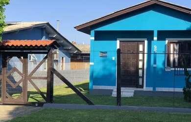 Imagem: A casa possui 2 Dormitórios, 1 Banheiro, 1 Vaga na garagem