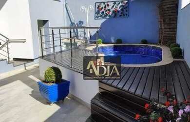 Imagem: A casa possui 3 Dormitórios, 5 Banheiros, 4 Vagas na garagem