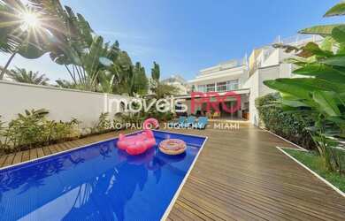 Imagem: A casa em condomínio possui 5 Dormitórios, 5 Banheiros, 4