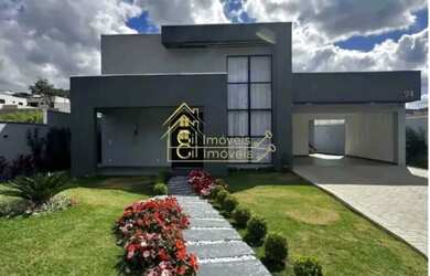 Imagem: A casa possui 5 Dormitórios, 5 Banheiros, 4 Vagas na garagem