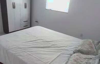 Imagem: A casa possui 2 Dormitórios, 1 Vaga na garagem e está localizado