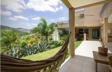 Imagem: A casa possui 5 Dormitórios, 5 Banheiros, 3 Vagas na garagem