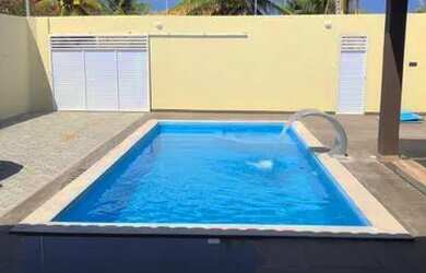 Imagem: A casa possui 3 Dormitórios, 5 Vagas na garagem e está localizado