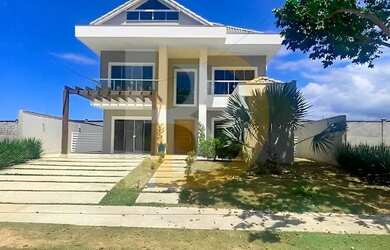 Imagem: A casa em condomínio possui 5 Dormitórios, 5 Banheiros, 2