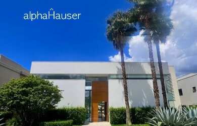 Imagem: A casa possui 4 Dormitórios, 5 Banheiros, 5 Vagas na garagem