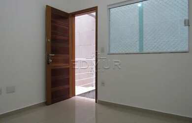 Imagem: A casa possui 2 Dormitórios, 1 Banheiro, 2 Vagas na garagem