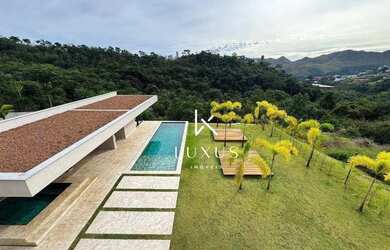 Imagem: A casa em condomínio possui 4 Dormitórios, 5 Banheiros, 5