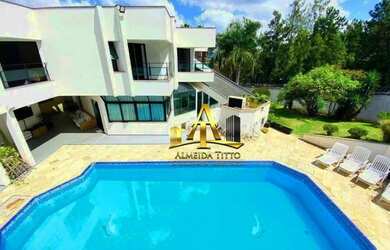 Imagem: A casa em condomínio possui 4 Dormitórios, 5 Banheiros, 5