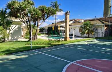 Imagem: A casa possui 4 Dormitórios, 5 Banheiros, 5 Vagas na garagem